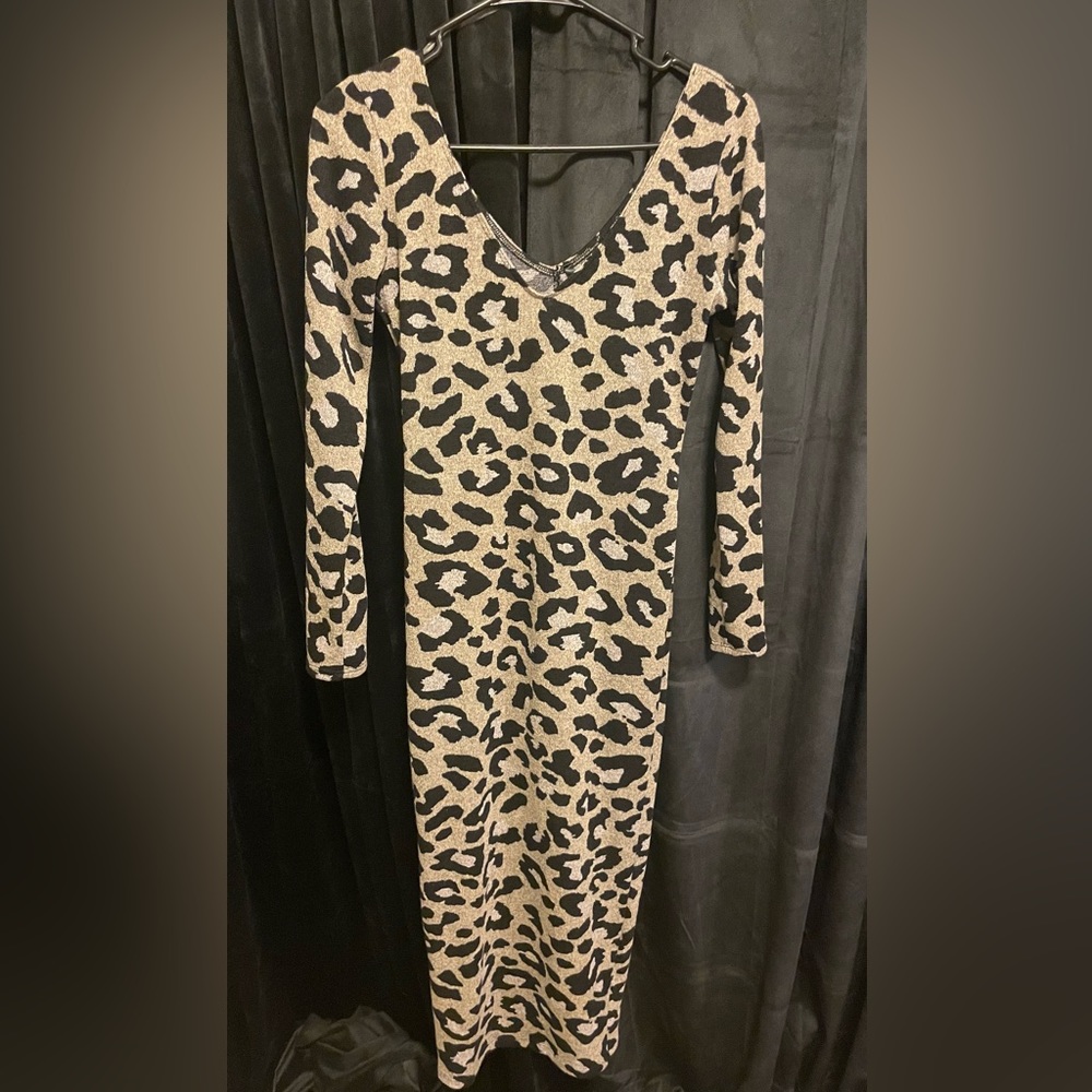 Touchdolls Boutique leopard print off the shoulder knit midi dress. Size Medium